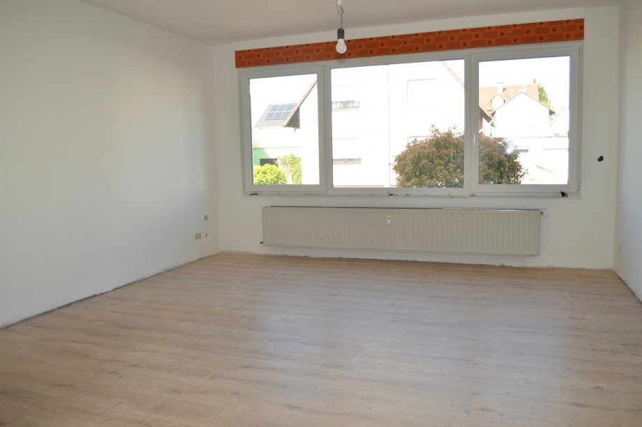 Wohnzimmer Erdgeschoss Mehrfamilienhaus Trebur