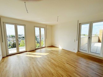 Hauptbild Helligkeit & Eichenholz: Barrierefreie 3-Zimmer-Wohnung mit West-Dachterrasse & Fernblick