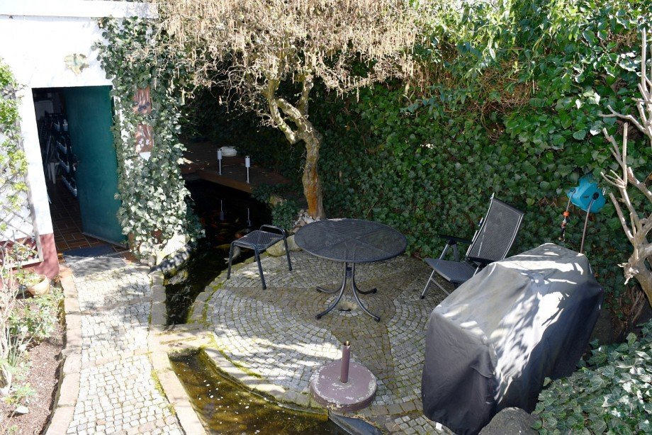 Sitzplatz am Wasserlauf Einfamilienhaus B�ttelborn-Worfelden