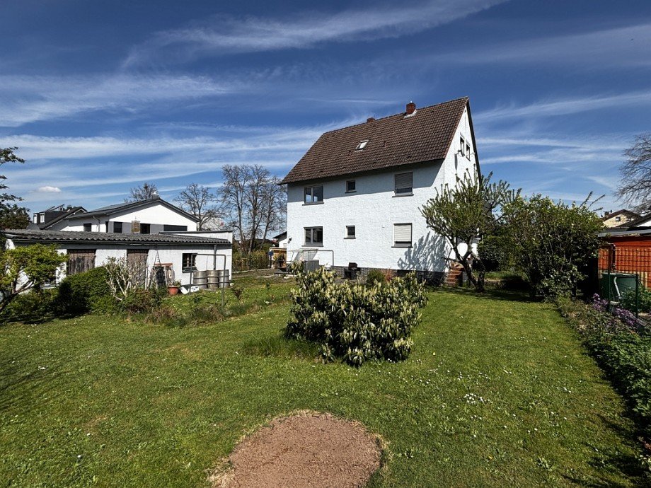 Hausansicht Gartenseite Etagenwohnung Messel