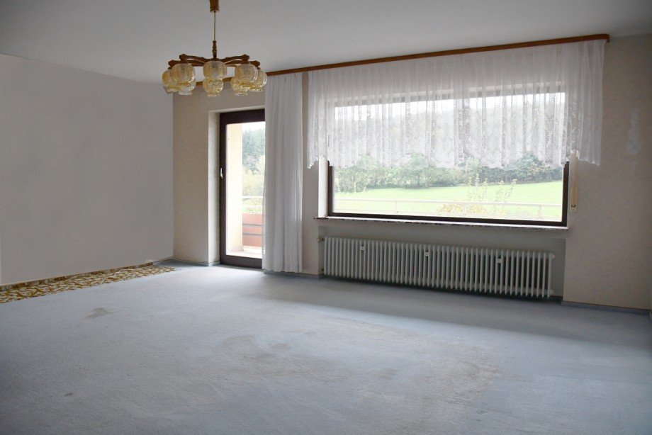Wohnzimmer OG mit Balkonzugang Einfamilienhaus Mossautal/Unter-Mossau